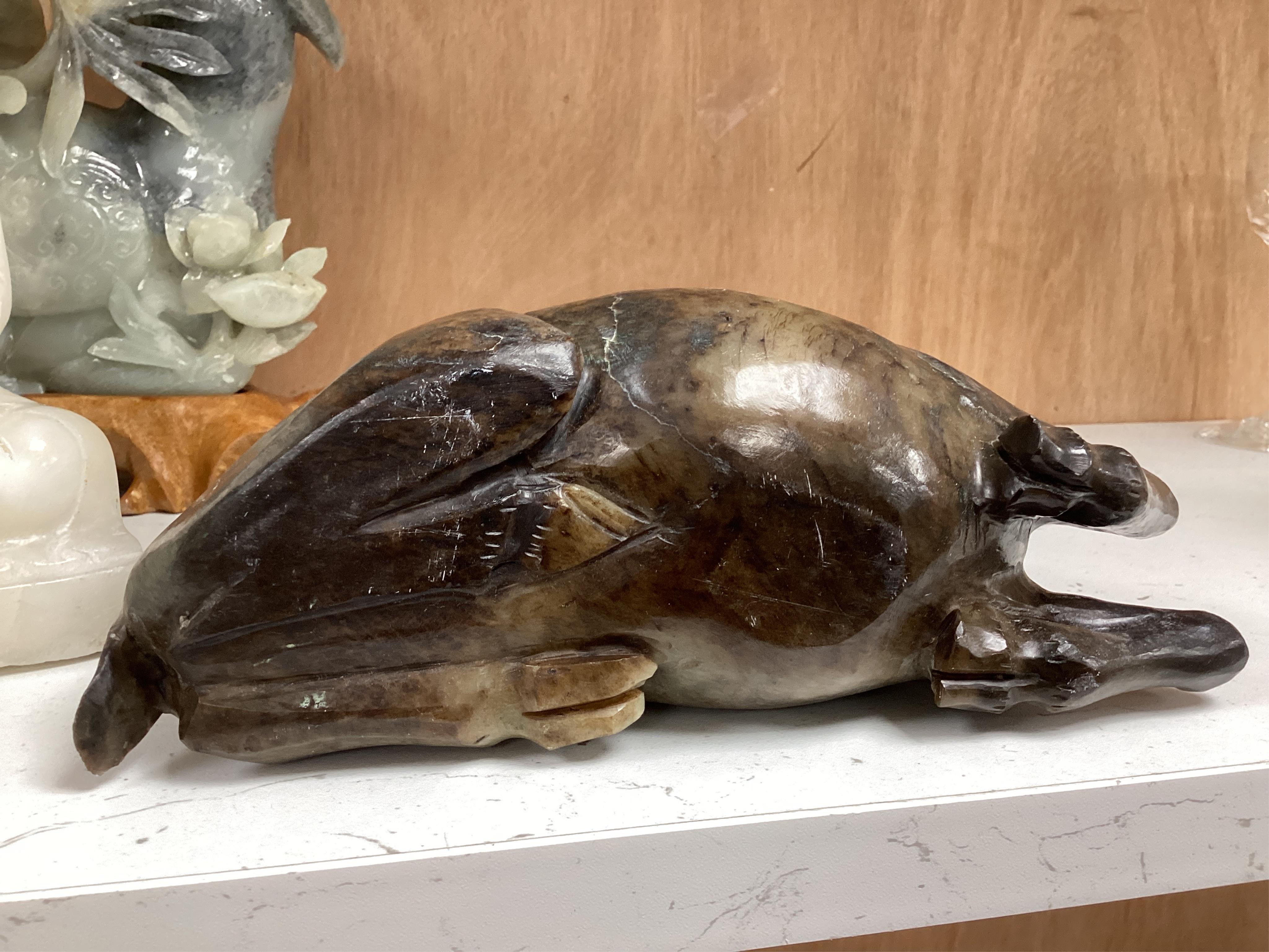 Two modern jade figures, together with a marble Buddha and a carved giltwood figure, largest 24cm wide